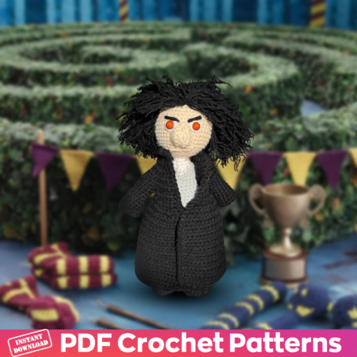 Crochet Sirius Black Amigurumi Pattern in wizard attire with wand.